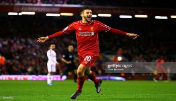 Adam Lallana scoring against Swansea City at Anfield